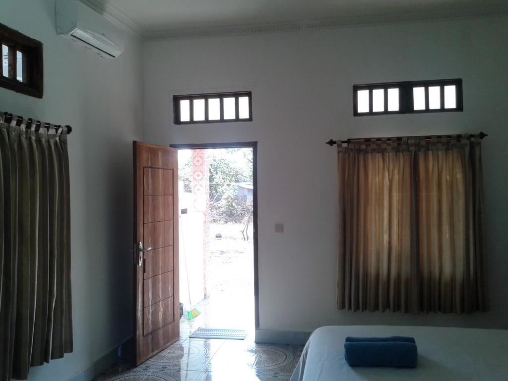 Putri Homestay Гили Мено Стая снимка