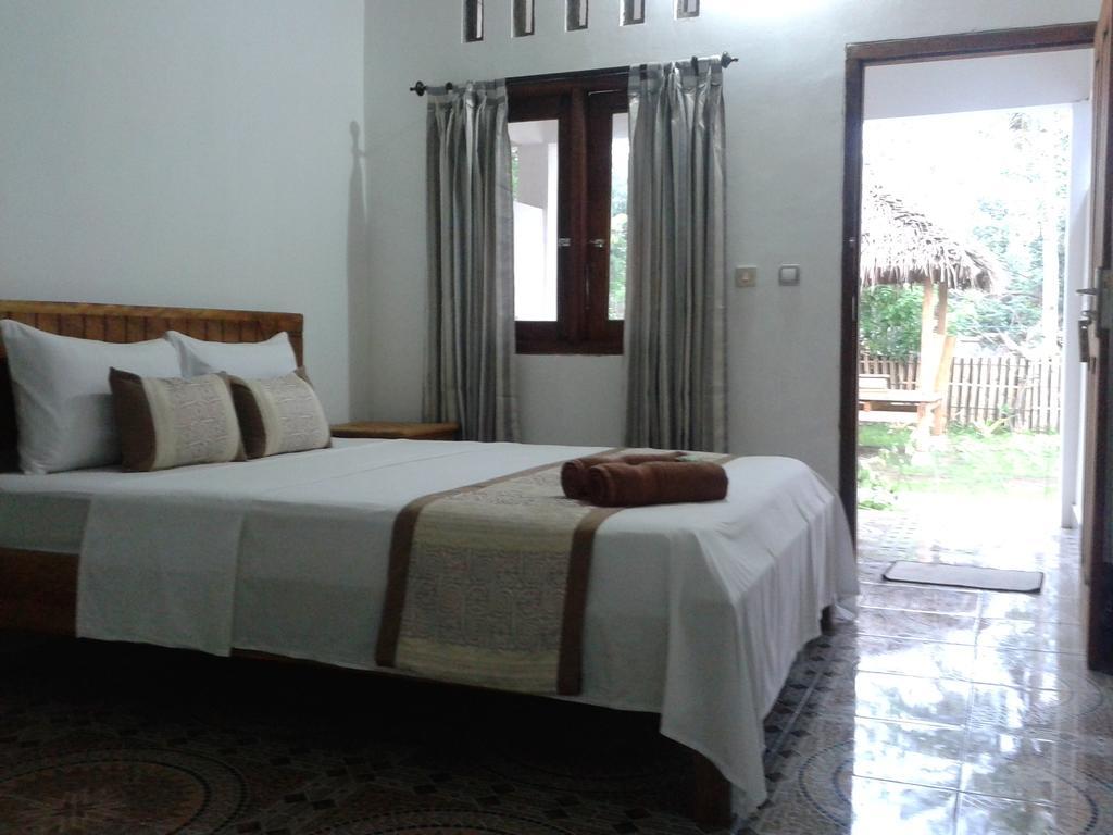 Putri Homestay Гили Мено Стая снимка
