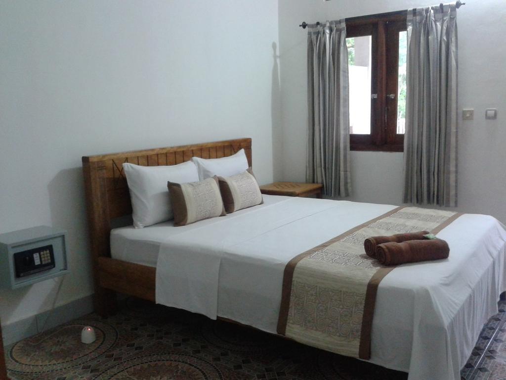 Putri Homestay Гили Мено Стая снимка