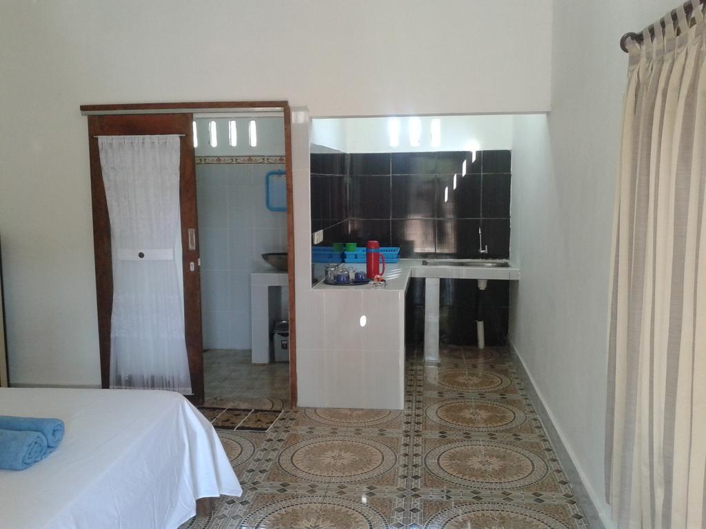 Putri Homestay Гили Мено Стая снимка