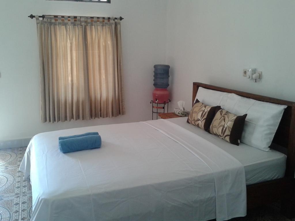 Putri Homestay Гили Мено Стая снимка