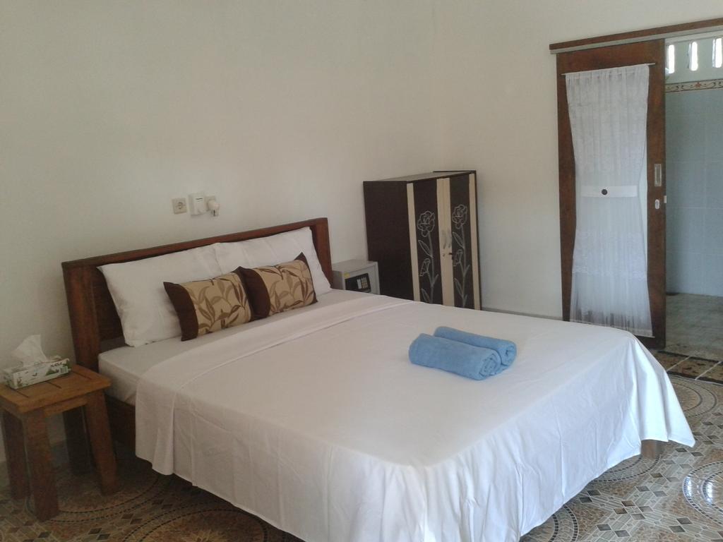 Putri Homestay Гили Мено Стая снимка