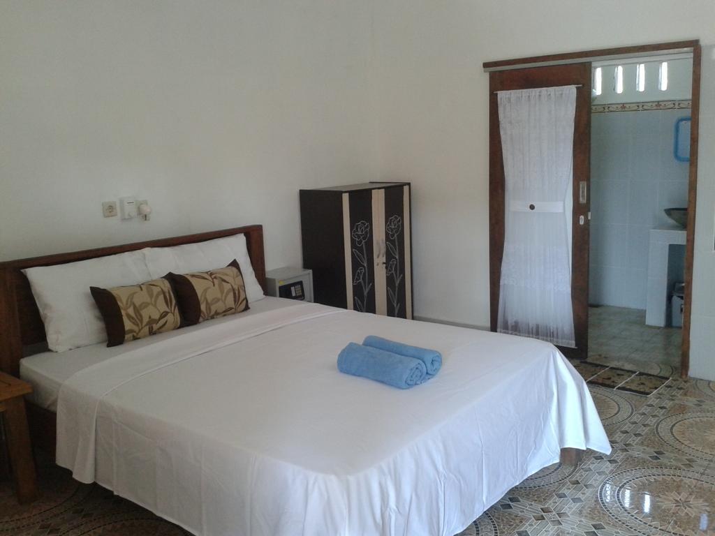Putri Homestay Гили Мено Стая снимка